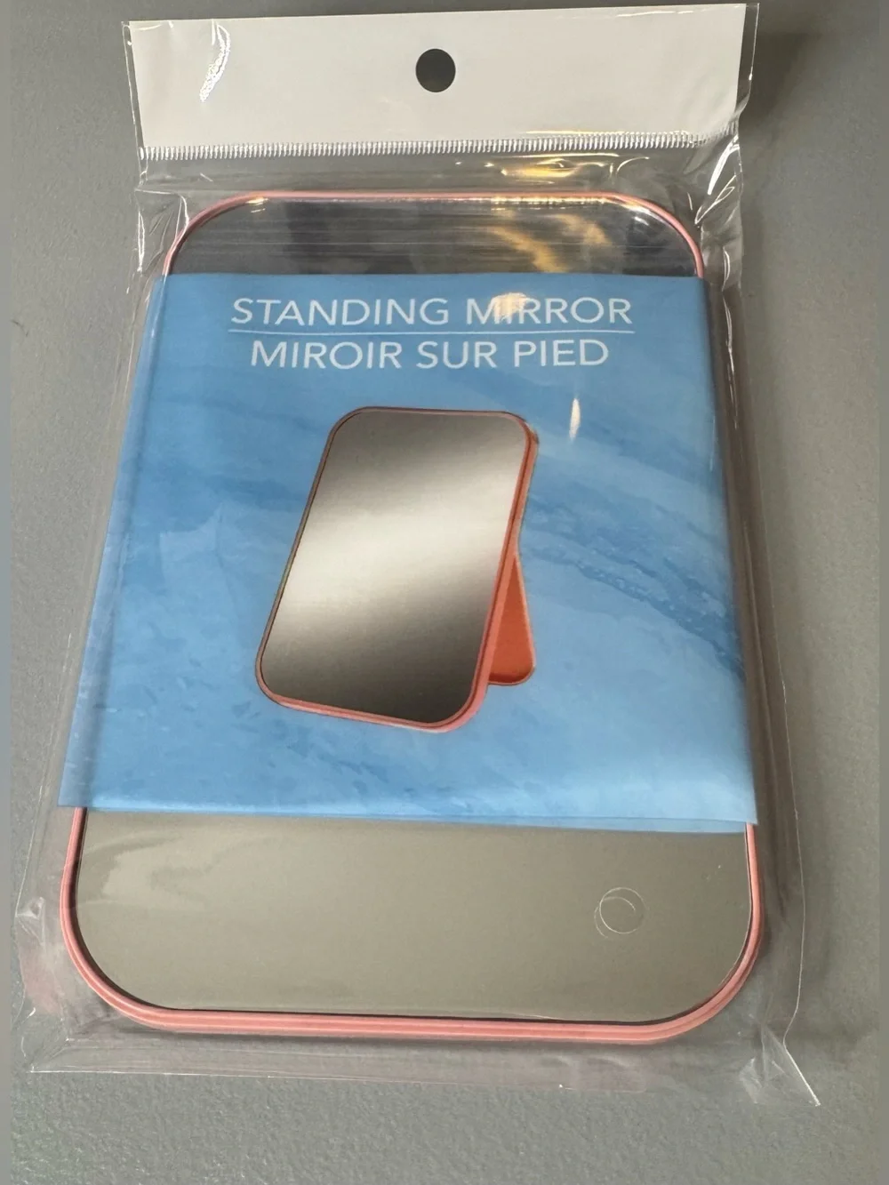 Standing Travel Mirror with Pink Frame vanity on the o convenient portable
